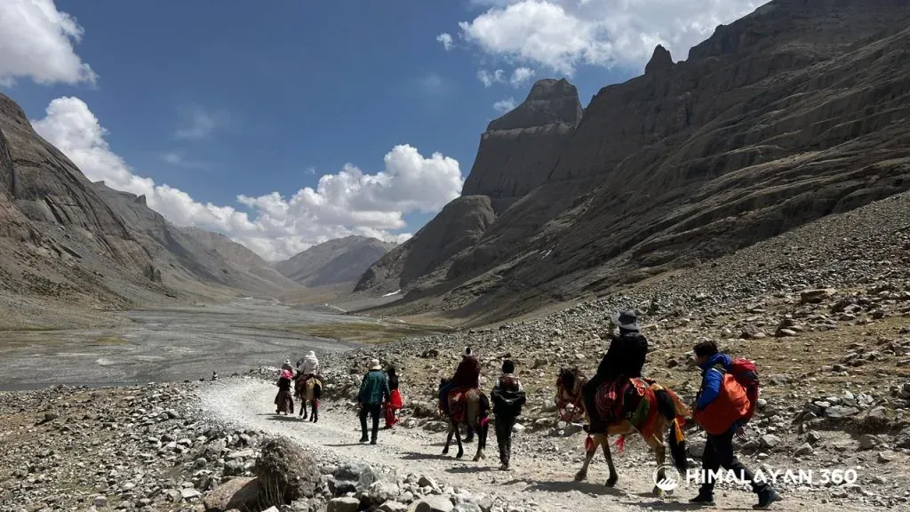 Travellers riding animals on Rocky Kailash Route