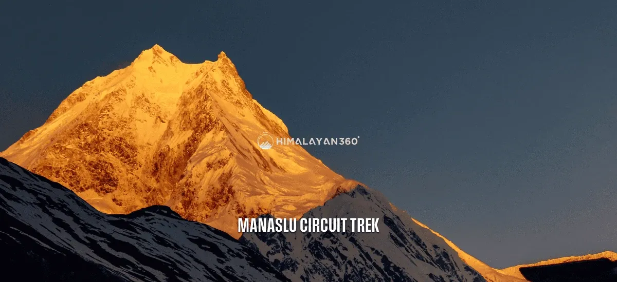 Sunrise over a glowing mount Manaslu and the traditional Buddhist stupa in the foreground - view from the trek to Manaslu Circuit Trek, Manaslu region.